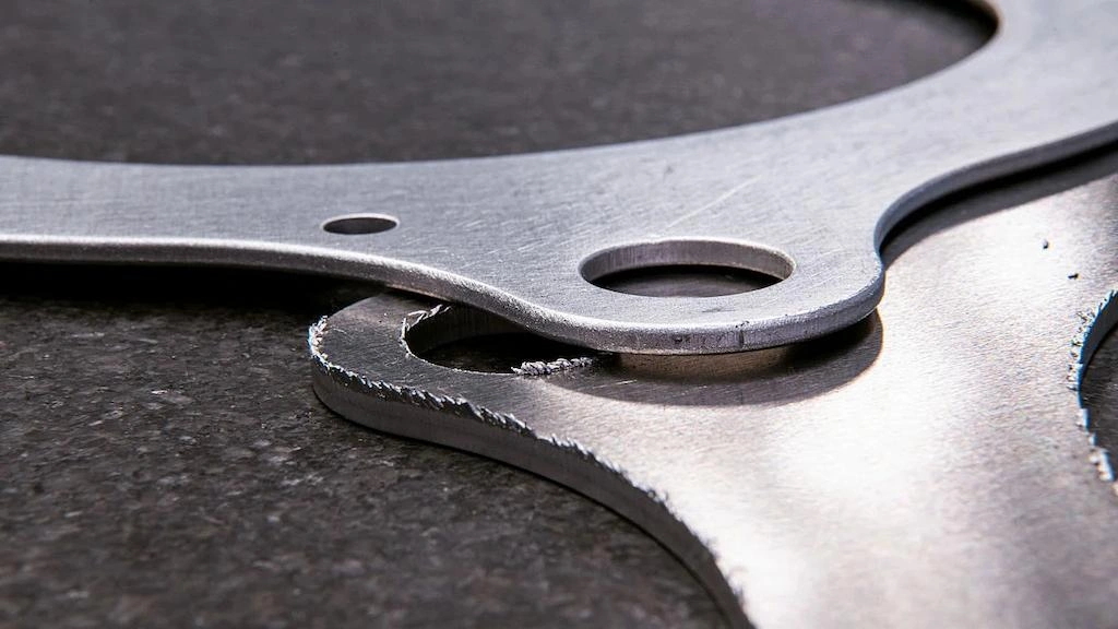 Sharp mechanical burrs-sourced: proleantech