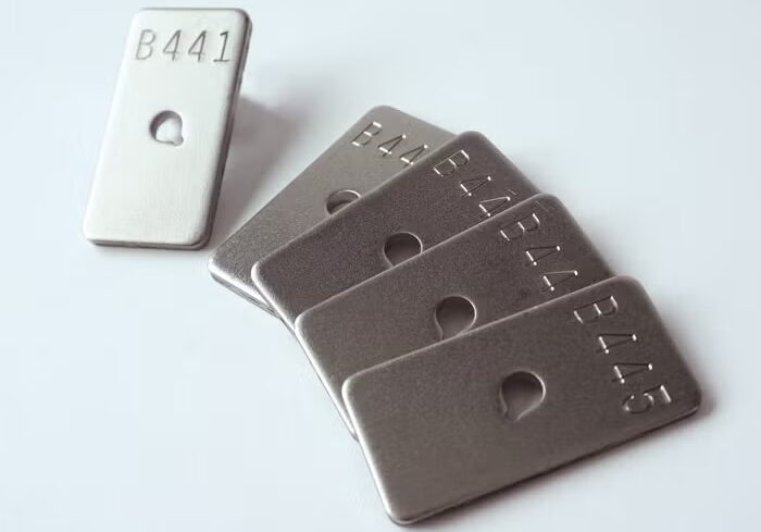 Deburred and rounded metal test panels-sourced: q-lab