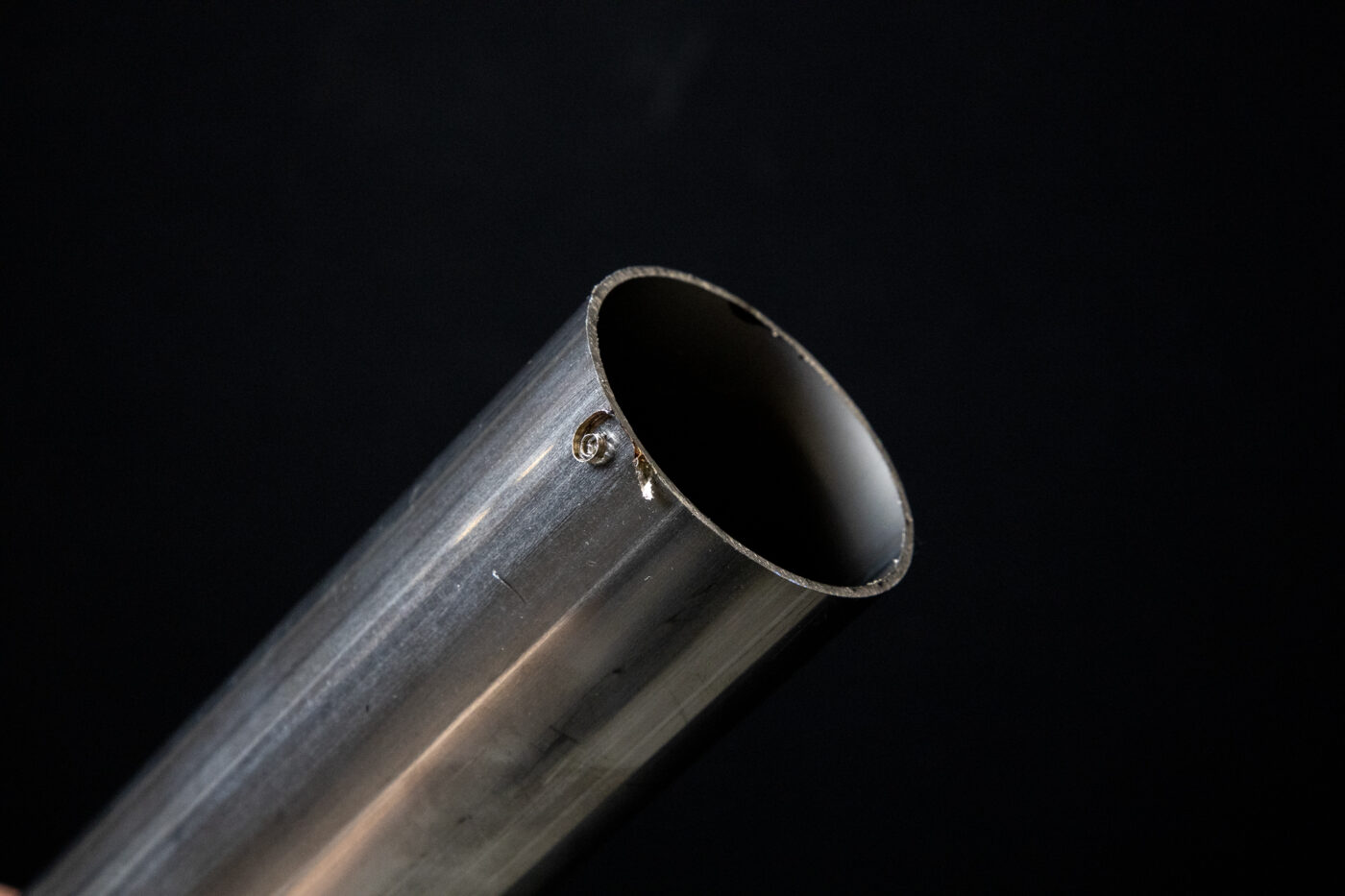 Curled metal flash and sharp exit burrs-sourced: proto1mfg